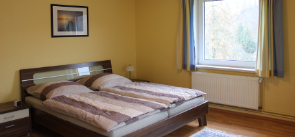 Großes Schlafzimmer Ferienwohnung Olivia